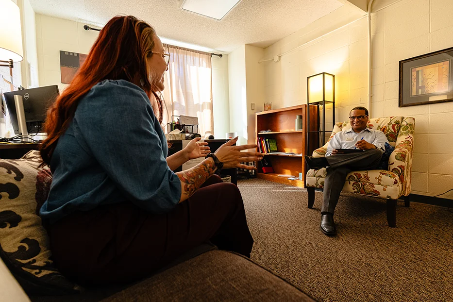 Student talking with a counselor