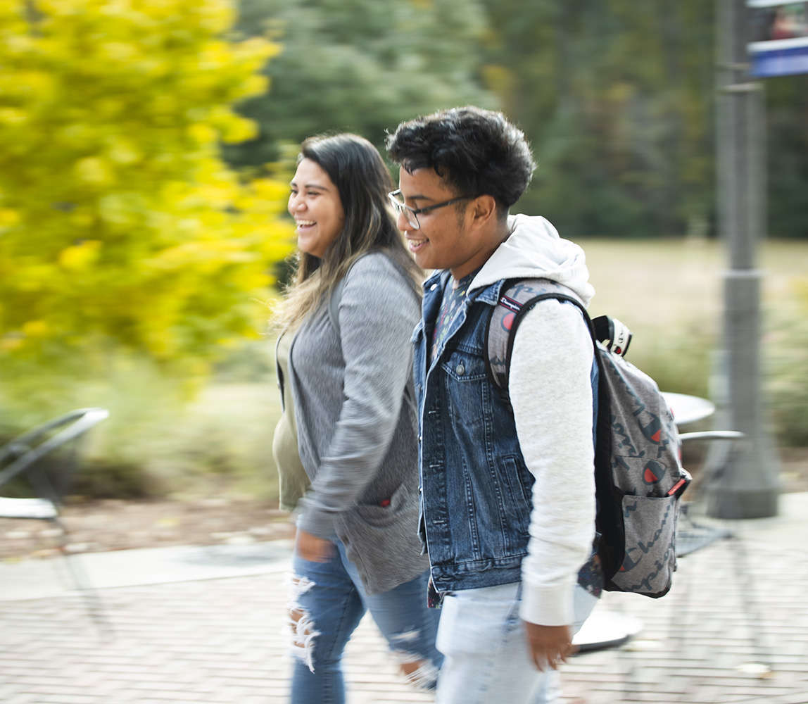students walking past outdoors