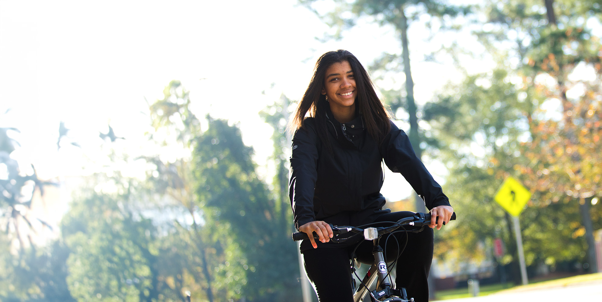 Student riding a bike