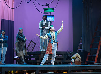 students performing on stage