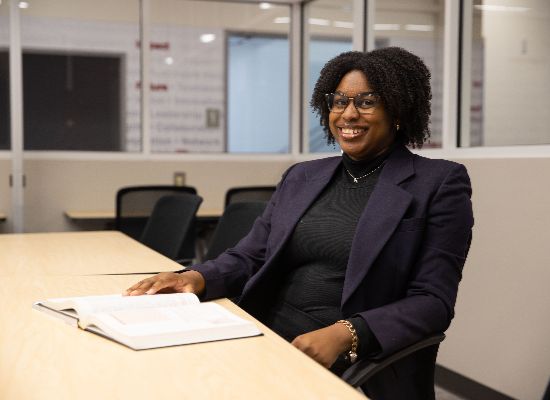 business woman seated at desk