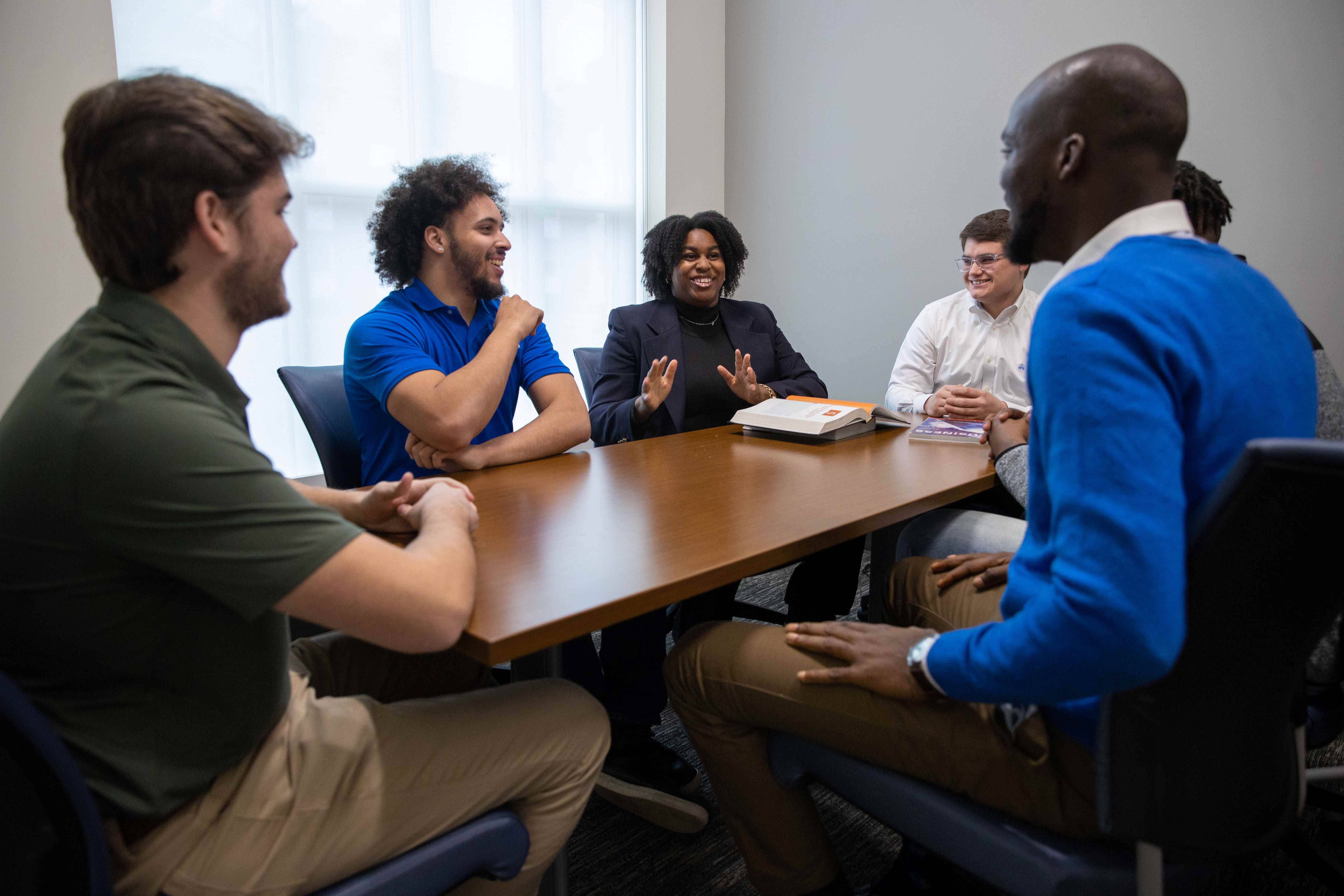 students sitting around a table