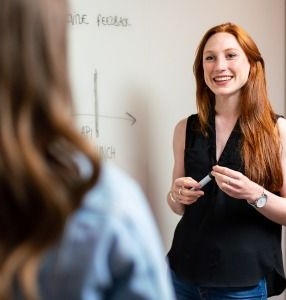 Professor talking to student
