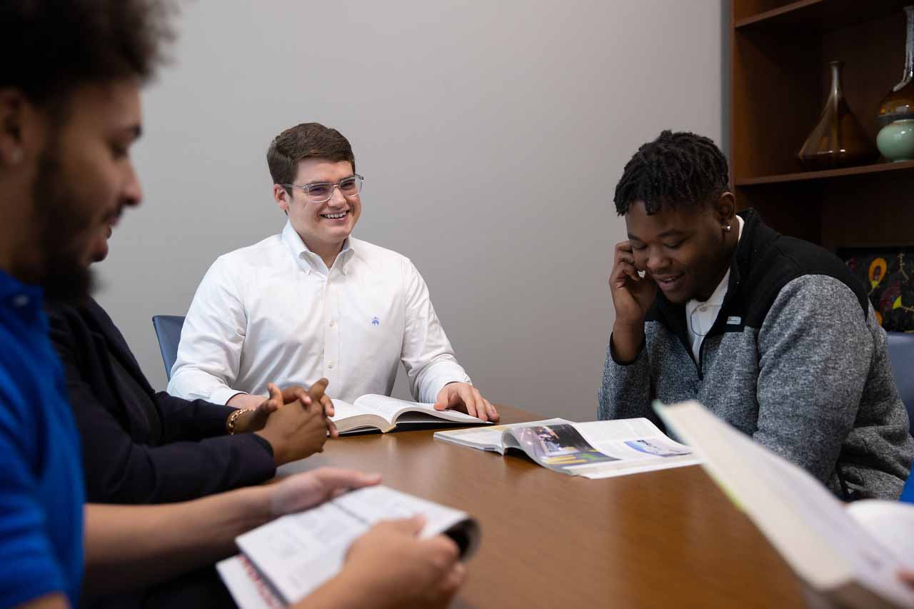 UWG Students Meeting Around Conference Table