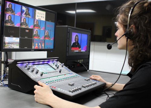 Student running audio board