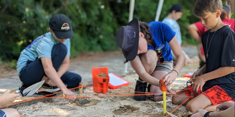 mock excavation with students